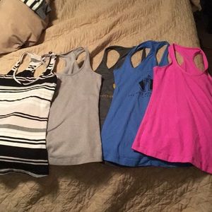 Lot of 8 lululemon tank tops sz4 great condition!